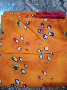Vibrant Orange Saree with Abstract Print