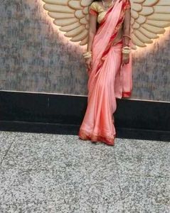 Elegant Pink Saree with Red Border