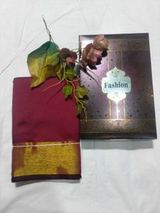 Elegant Maroon Saree with Golden Border