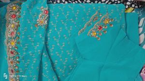 Stunning Embroidered Teal Saree