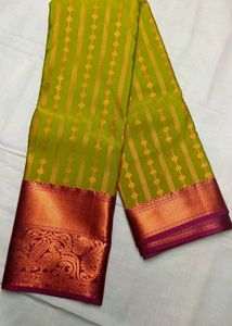Vibrant Green Silk Saree with Pink Border