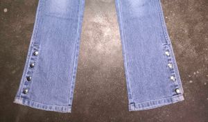 Women's Light Wash Flare Jeans with Button Detail