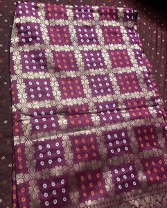 Elegant Burgundy Saree with Golden Motifs