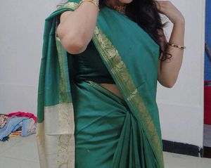 Elegant Teal Green Saree with Gold Border