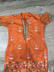 Orange Embroidered Kurta With Free Pants