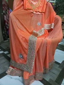 Elegant Peach Saree with Embellishments