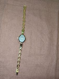 Elegant Gold Tone Watch with Rhinestones