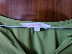 This is a Beautiful green colour Top... It's so fashionable as you can see in the picture... It's real price is also mentioned... I bought it resently... from Mintra....