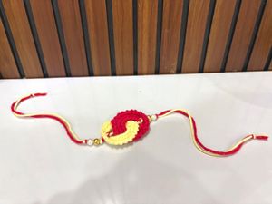 Handmade Crochet Rakhi - Red & Yellow