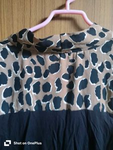 Chic Black Top with Animal Print Collar