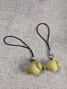 One Smiski Phone Charm