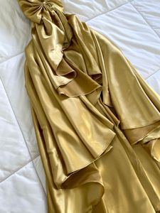 Elegant Gold Strapless Gown with Bow Detail