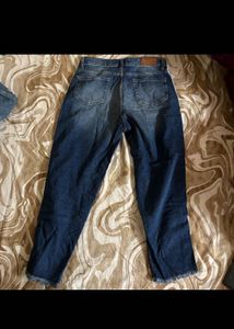 Distressed Blue Jeans with Stripes