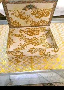10. Decorative Gift Box with Floral Accent