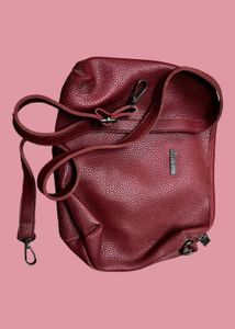 Original Flaunt Unused Maroon Sling bag