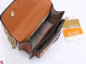 MICHAEL KORS**SIGNATURE LOGO PRINT HEATHER BAG*
