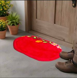 Vibrant Red Oval Doormat with Floral Design