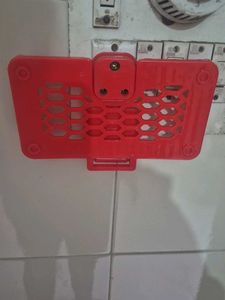 Red phone Shelf while charging