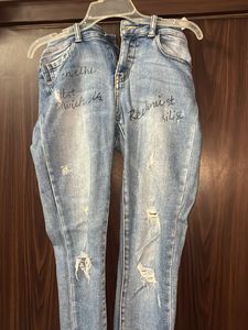 Distressed Jeans with Graphic Detail