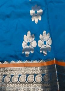 Elegant Teal and Gold Saree