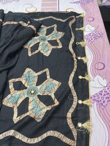 Elegant Black Saree with Unique Print