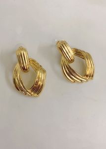 Gold Tone Interlocking Drop Earrings