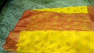 Vibrant Yellow Saree with Orange Blouse