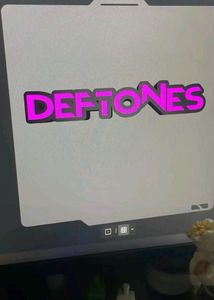 taylor swift and TXT  logos