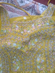 Nyra cutYellow Embroidered kurta Choli Set