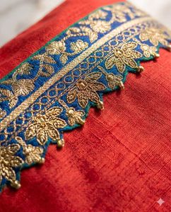 Elegant Red Pouch with Embellished Border