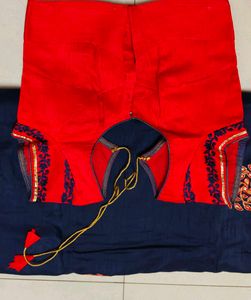 Elegant Blue Saree with Red Embroidery desig