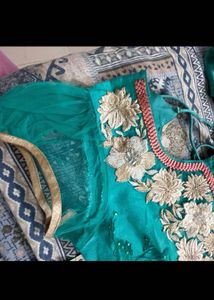 Elegant Teal Kurta Set with Intricate Embroidery