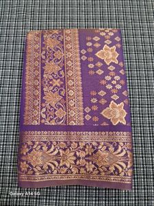 Elegant Purple Saree with Golden Floral