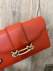 Vibrant Orange Clutch with Gold Hardware