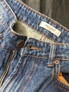 Distressed Blue Denim Jeans