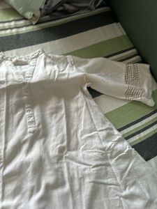 Elegant White Kurta Set with Intricate Detailing