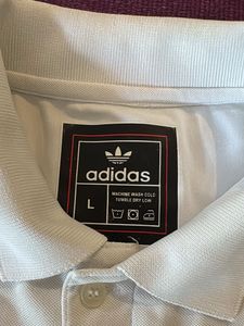 2 Men's White Polo Shirts