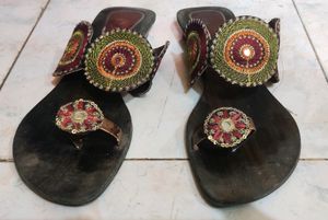 3 Pairs Of Flipflops And Bellies
