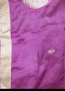 Shimmering Purple Fabric with Gold Trim