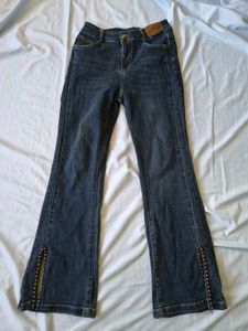 Flared Jeans with Studded Slits