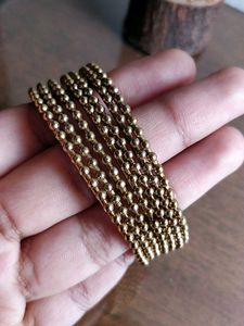 Set of 7 Golden Beaded Bangles