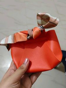 Chic Light Blue Handbag with Scarf Detail