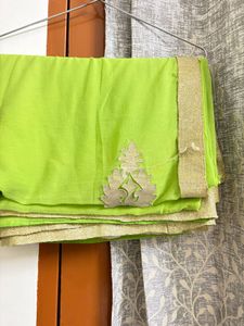 Vibrant Green Saree with Golden Border