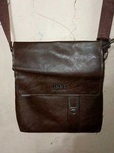 Brown Leather sling purse