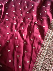 Maroon Georgette Saree with Golden Motifs