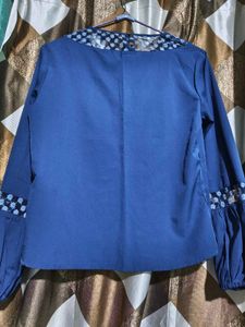 Stylish Blue Top with Embellished Neckline