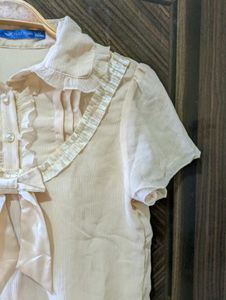 Cream Ruffled Bow Blouse