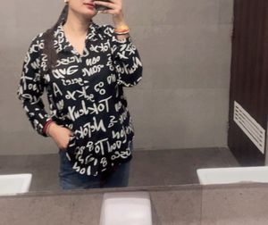 Black &amp; White Graphic Print Button-Up Shirt