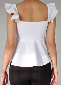 white frill sleeveless top
