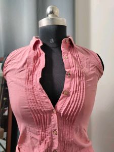 Sleeveless Pink Button-Up shirt
